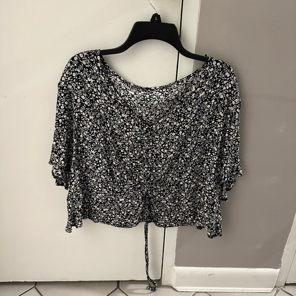 Tops - Black floral top (shein size) - has string in the middle to bunch up/down
